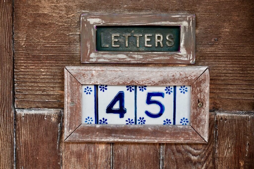 Letter opening in door.